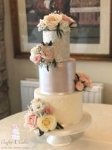 3 tier pink Shimmer sparkle wedding cake with fresh flowers